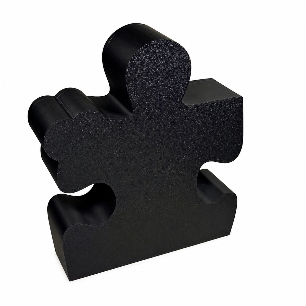 Rear view of black healthcare puzzle piece plaque and integrated stand
