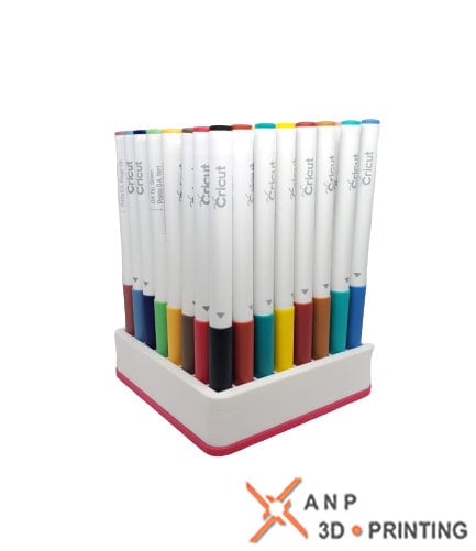64-slot 3D-printed organizer holding Cricut pens with a white top and pink base