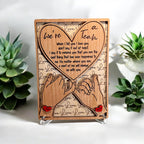 Custom engraved love keepsake featuring names and a heartfelt message, displayed on a wooden stand